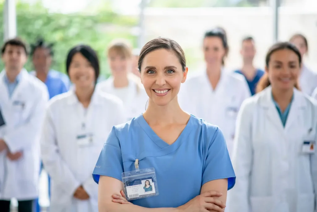 group of medical professionals smiling at camera